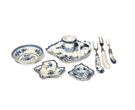A Bow blue and white chamberstick, c.1755-58, the drip pan formed as a leaf and painted with Oriental flowers, two Bow pickle