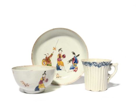 An early Worcester blue and white coffee cup, c.1753-54, the reeded form with seven scallops to the rim, painted with a conti