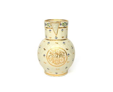A Caughley cabbage leaf jug, 1780-90, decorated with a gilt monogram below the spout, the moulded sides decorated with gilt s