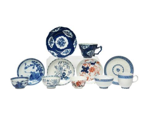 A group of English porcelain teawares, c.1760-70, including a Bow trio of teabowl, coffee cup and saucer moulded with reeding