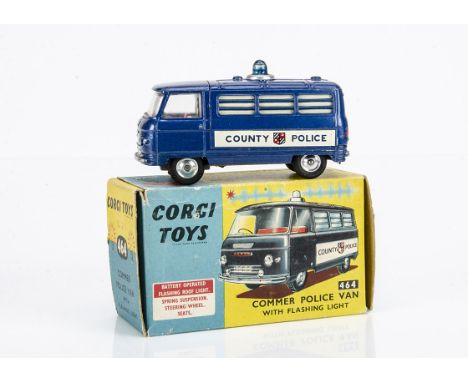 A Corgi Toys 464 Commer Police Van, dark blue body, 'County Police' decals, window bars, blue roof light, spun hubs, in origi