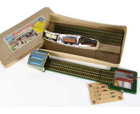 A Gescha Tinplate Clockwork 'Universal Transport Station' Toy Nr.80/3, comprising loco with two wagons, complete track with e