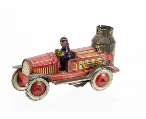 A Pre-War Arnold Tinplate Clockwork Fire Engine #640, red detailed tinrpinted body, Firemen driver, plated wings, gold steam 