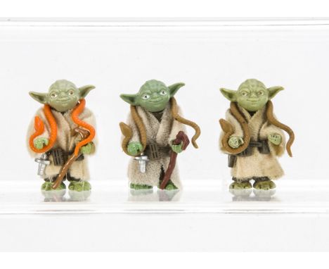 Vintage Star Wars Yoda Action Figures, three examples, two with brown eyes, one with black eyes, F-E, orange snake and light 
