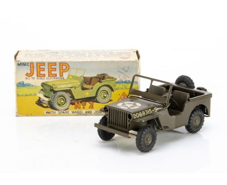 A Tri-ang Minic Tinplate Clockwork U.S Army Jeep No 2, military green body with spare wheel and brown plastic jerrycan, in or