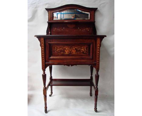 A late Victorian/Edwardian rosewood and inlaid cabinet of small proportions, the moulded edge rectangular top surmounted by a