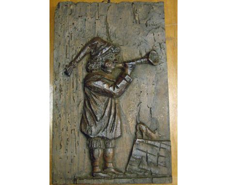Naïve School, possibly 17th century, a wood panel of rectangular form, carved in relief with a huntsman blowing a horn and a 