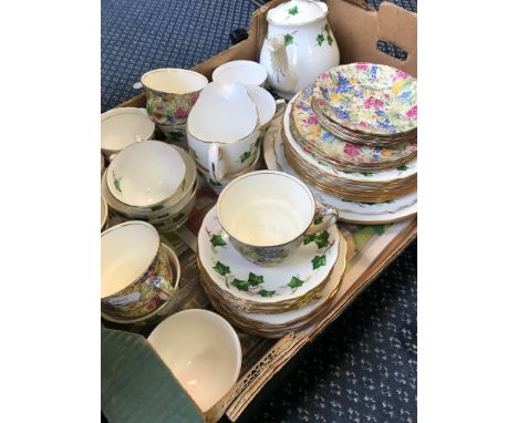 A large Ivy Leaf tea-service to include cups, saucers etc. Together with a Royal Winton style tea set to include four cups an