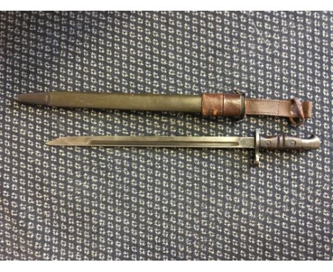 A U.S. bayonet with wooden handle and leather scabbard