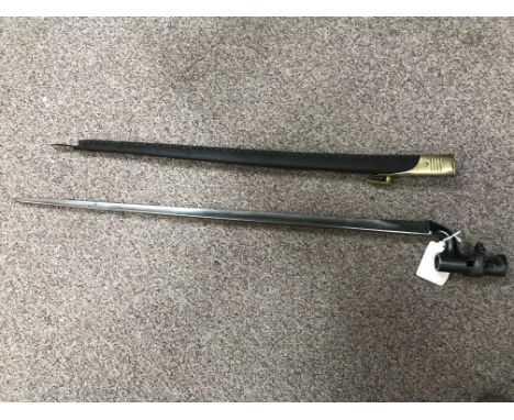 A 19th Century English bayonet in leather scabbard