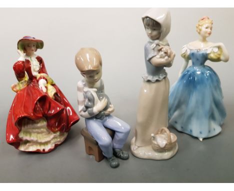 Two Nao figurines together with two Royal Doulton figurines, Top O' The Hill and Enchantment.