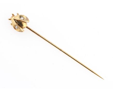 A 9ct yellow gold diamond ladybird stick pin, hallmarked Birmingham 1979.