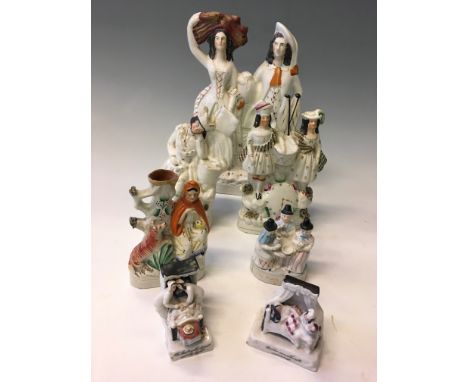 A group of 7 Staffordshire flat-back figurines to include Red Riding Hood, “The Last in Bed to Put Out the Light” and “The We