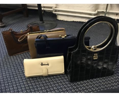 A group of four vintage handbags and one Harrods purse