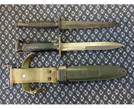 A commando knife together with American dagger with scabbard.