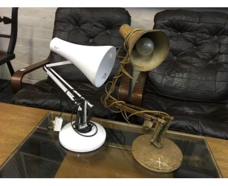 Two Anglepoise lamps and one chrome adjustable lamp.