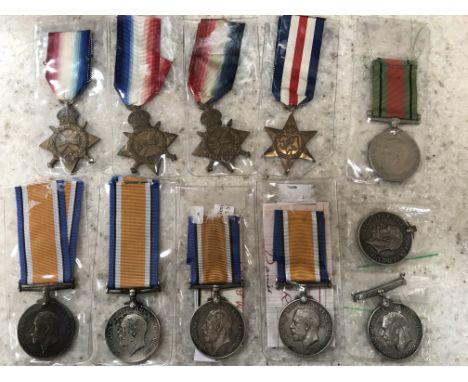 A group of eleven medals to include the 1914-15 Star awarded to W. J. Wells, the 1914-15 Star awarded to J. K. Gibson, the 19