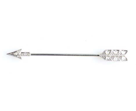 A diamond set arrow jabot pin, the arrow shaped design set with rose cut diamond accents, unmarked white metal, length approx