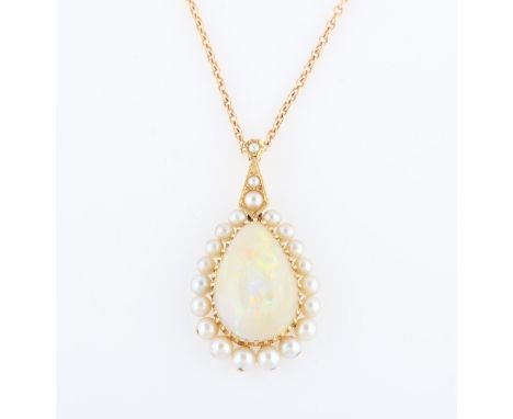 An opal and pearl pendant, set with a pear cut opal cabochon, measuring approx. 20x13mm, surrounded by a border of graduated 