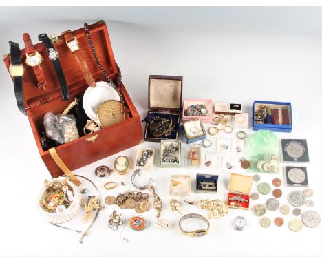 A lot to include, charms stamped silver, a miniature cap gun, various coins, brooches, pendants, necklets, bracelets, earring