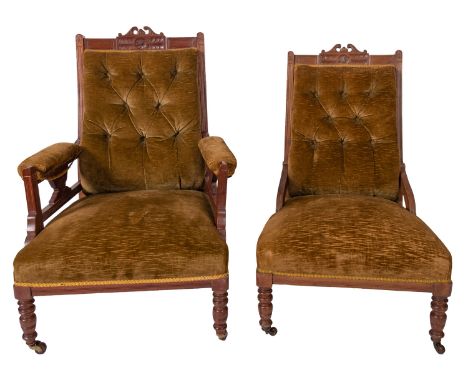 A Victorian Gentleman's mahogany open armchair with matching lady's chair, the upholstered button down back with carved pater