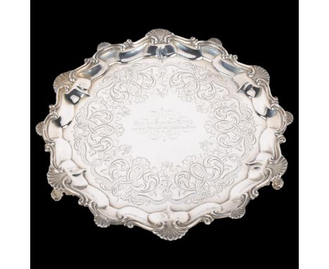 A Victorian circular silver salver, Daniel & Charles Houle, London 1863, shell and foliate pie crust rim, with engraved decor