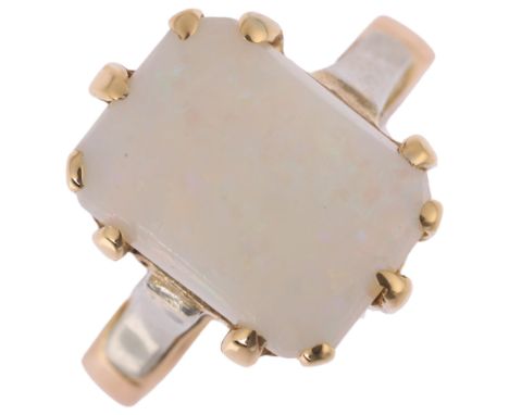 An 18ct gold synthetic opal dress ring, Birmingham 1900, claw set with rectangular cabochon opal, setting height 13.7mm, size