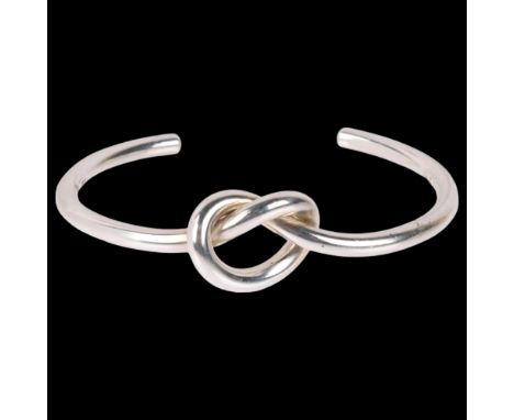 GEORG JENSEN - a Danish modernist sterling silver Love Knot cuff bangle, model no. A44B, knot height 17mm, internal circumfer