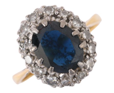 An 18ct gold sapphire and diamond oval cluster ring, platinum-topped set with oval mixed-cut sapphire and eight-cut diamonds,