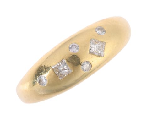 An 18ct gold diamond bombe ring, maker GA, London 1999, rub-over set with Princess and modern round brilliant-cut diamonds, t