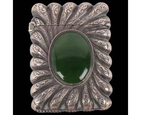 A Victorian silver jadeite spiral Vesta case, Joseph Hawkins, Chester 1890, 4.5cm x 3.5cmA few light dents on corners otherwi