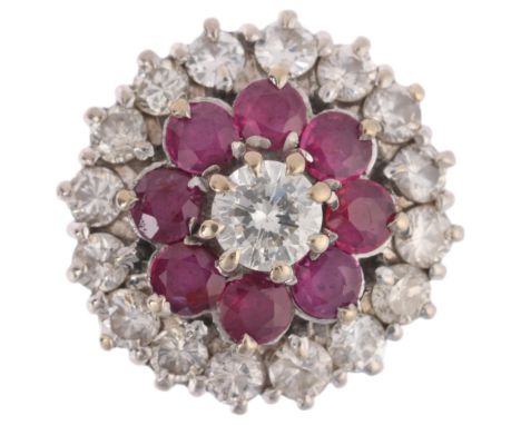 An 18ct gold ruby and diamond flowerhead cluster ring, claw set with round-cut rubies and modern round brilliant-cut diamonds