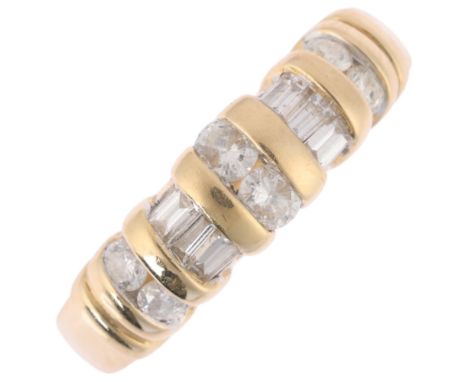 A 14ct gold diamond half hoop ring, channel set with modern round brilliant and tapered baguette-cut diamonds, total diamond 