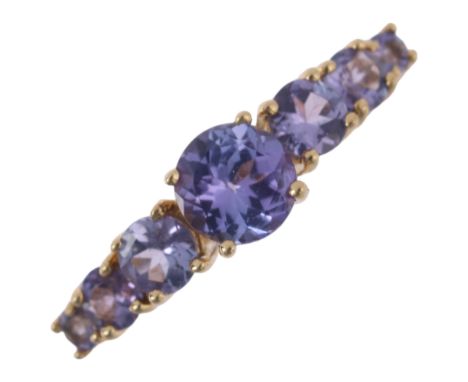 A 9ct gold seven stone tanzanite half hoop ring, setting height 5.1mm, size M, 1.9gNo damage or repair, all stones present, f