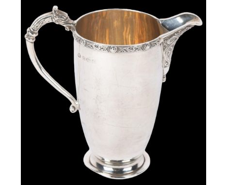 A George VI silver Celtic Revival cream jug, Adie Brothers Ltd, Birmingham 1937, 10cm, 3.2ozBody has numerous light dents, ge