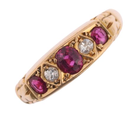 An early 20th century 18ct gold graduated five stone ruby and diamond half hoop ring, maker JG, Chester 1911, setting height 
