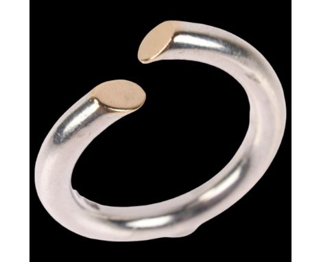 FRITZ HEIRING SORENSEN - a Danish modernist sterling silver and silver-gilt torque ring, band width 3.9mm, size T, 8.4gNo dam