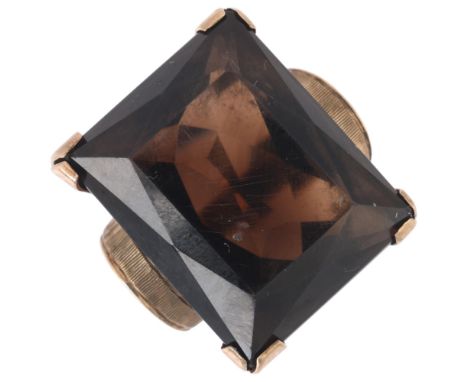 A large 1970s 9ct gold smoky quartz tank ring, maker BJM, smoky quartz measures approx: 24.7 x 19.7 x 13.7mm, size L/M, 19.5g