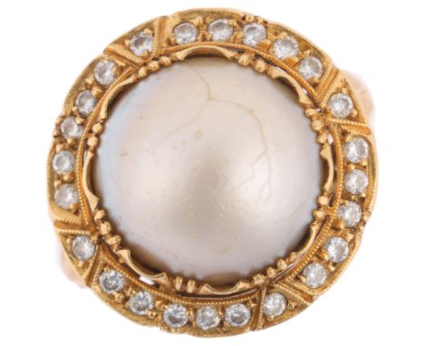 A Portuguese 800 gold Mabe pearl and diamond cluster ring, pearl measures approx 12.75 x 9.00mm, total diamond content approx