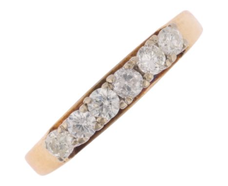 An 18ct gold (tested) six stone diamond half hoop ring, claw set with modern round brilliant-cut diamonds, total diamond cont