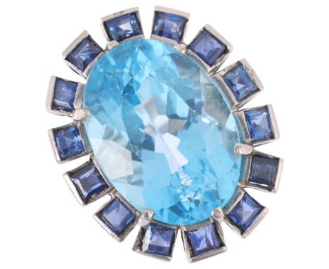 A white gold plated silver blue topaz and sapphire oval cluster ring, setting height 24.8mm, size J/K, 8.5gAll stones present