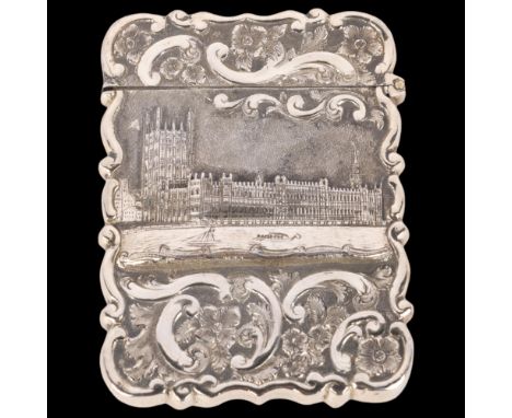 A Victorian castle-top rectangular visiting card case, Hilliard & Thomason, Birmingham 1867, relief embossed decoration depic