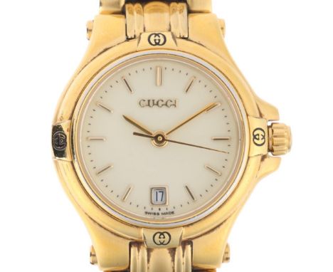GUCCI - a lady's gold plated 9240L quartz bracelet watch, cream dial with gilt baton hour markers, pencil hands, sweep centre