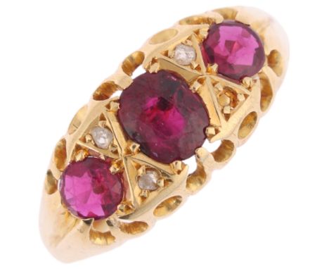 An 18ct gold seven stone ruby and diamond half hoop ring, maker CHC, Birmingham 1912, setting height 8.1mm, size O, 2.4g (1 s