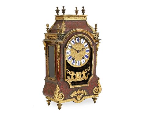 A French "Boulle" Striking Mantel Clock, circa 1870, case with scroll and mask gilt metal mounts, urn shaped finials, tortois