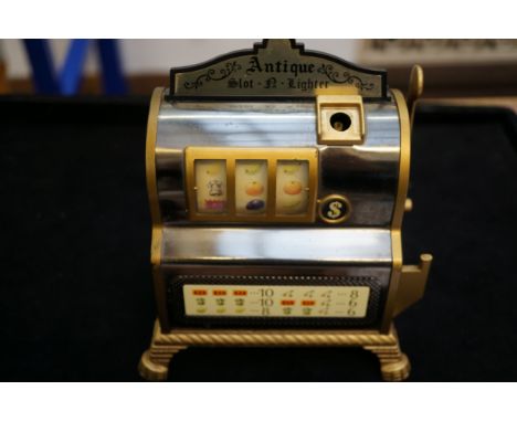 Antique slot/A/Lighter cigarette lighter in the form of a slot machine 