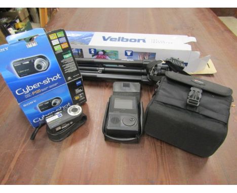 Canon cyber-shot boxed camera, a boxed tripod, mini tv and camera bags