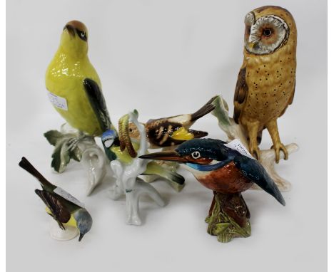 A GOEBEL SCULPTURE OF A BARN OWL on a perch, together with a Beswick model of a kingfisher and four further continental porce