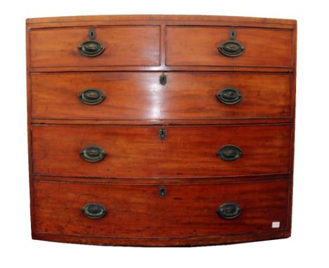 A 19TH CENTURY MAHOGANY BOW FRONTED CHEST of two short and three long drawers 115cm wide x 51cm deep x 87cm high (base lackin