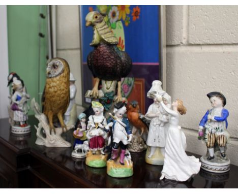 A COLLECTION OF ANTIQUE AND LATER PORCELAIN FIGURINES to include a Goebel barn owl, 21cm in height